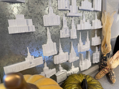 multiple temple magnets on a tin board