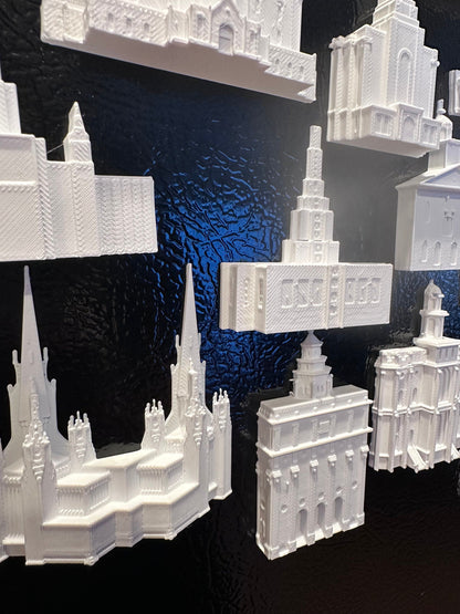 multiple temple magnets on a tin board