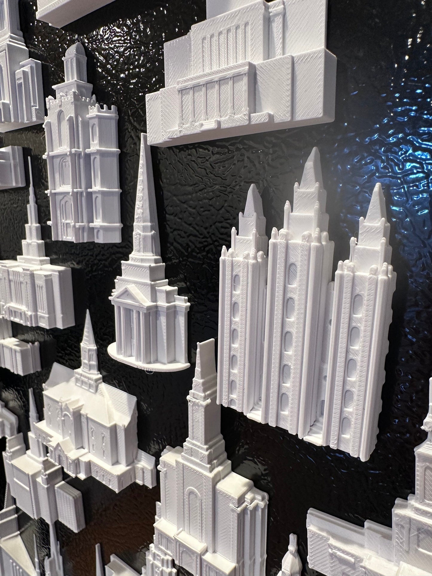 multiple temple magnets on a tin board