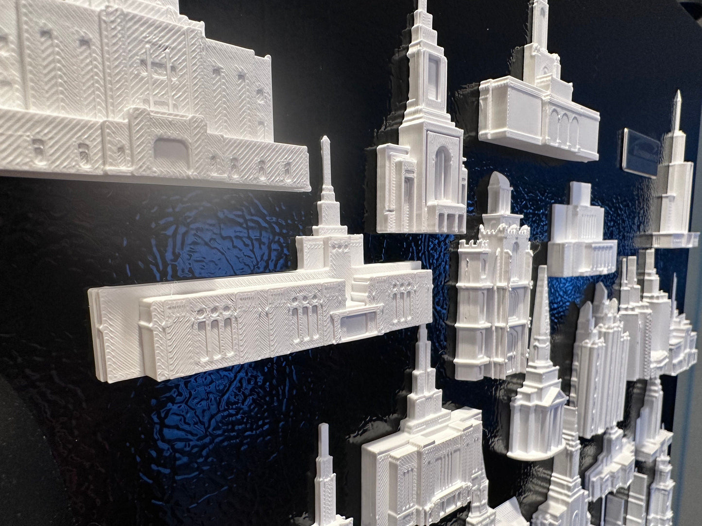 multiple temple magnets on a tin board