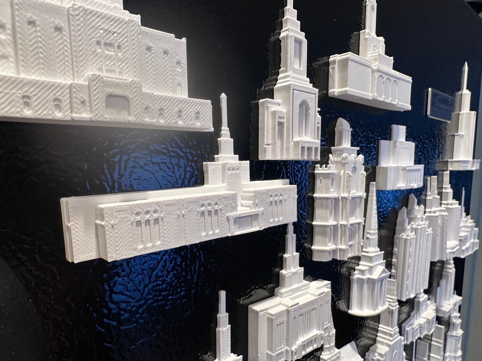 multiple temple magnets on a tin board