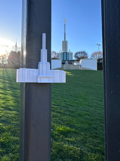 a temple magnet on a metal pole outside a temple